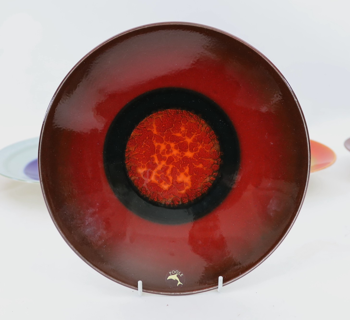 Alan Clarke for Poole Pottery. A set of nine ‘Alignment of the Planets’ chargers and one duplicate, c.2000, 26cm diameter